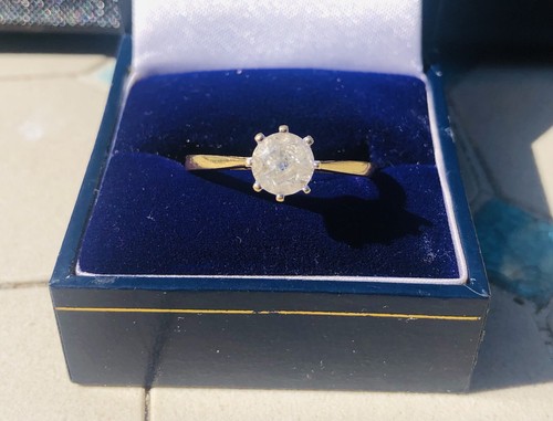 Carat gold solitaire - carat,