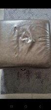 brown leather footstool with