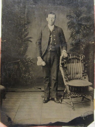 Man standing one hand on - -,