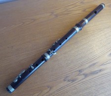AN OLD WOODEN FLUTE BY BESSON & Co LONDON - NEEDS ATTENTION