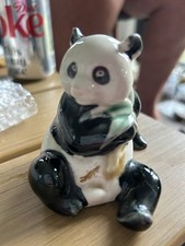 Seated Panda With Bamboo