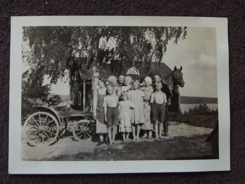 Farmer family standing in - farmer's,