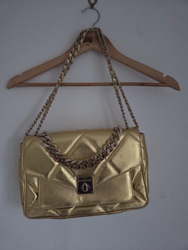 Gold coloured russell and - russell,