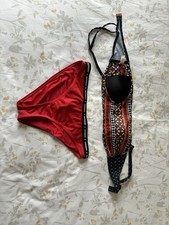 Girls Super dry Nikon Top And Bottoms Used In Good Condition