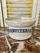 An antique ironstone butter