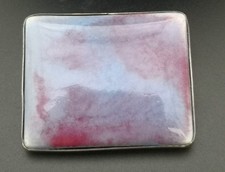 Large oblong Ruskin ceramic set in silver