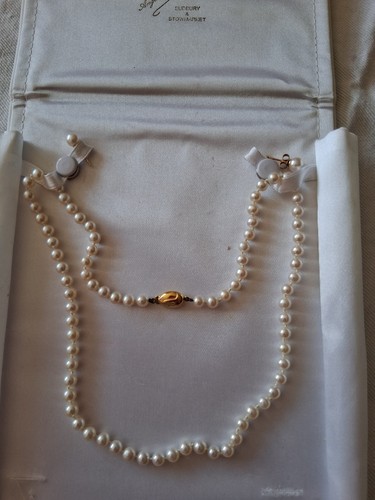 Pearl necklace and earrings - and,
