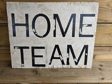 large wooden cricket scoreboard numbers and lettering. double sided home team