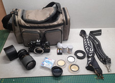 Praktica B100 with lence and