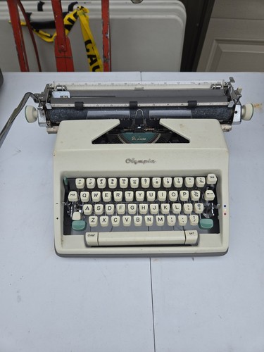 Vintage olympia sm9 typewriter - olympia,