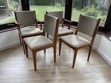 4 Dining Chairs designed by Johannes Andersen in Teak - 2 Carver chairs included
