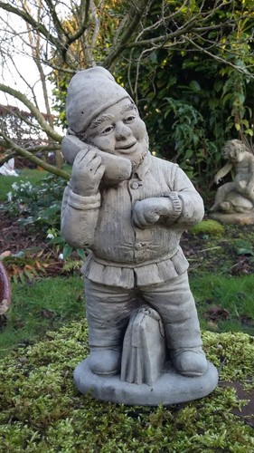 Stone garden gnome with - gnome,