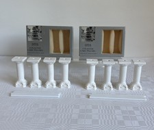 Marks & Spencer "8 PLASTER CAKE PILLARS WITH DOWLING RODS". Excellent condition.