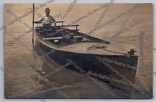 Antique RPPC man in motor boat