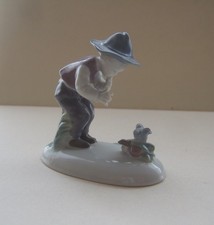 VINTAGE METZLER  & ORTLOFF FIGURINE - BOY WITH BIRD