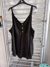 Ladies Black Top With Straps Size 24. Three Brown Buttons On Front. Never Worn