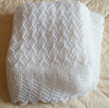 STUNNING HAND KNITTED BABY