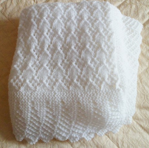 Stunning hand knitted baby - stunning,