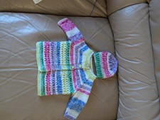 hand knitted baby cardigan and