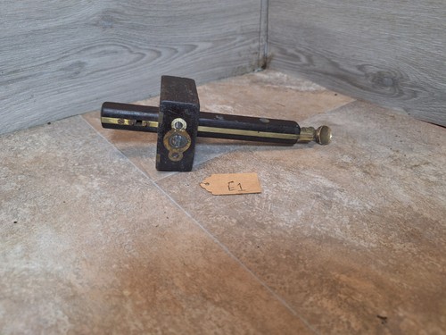 Antique wood and brass mortise - and,
