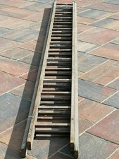 Double extending wooden ladder 13ft when closed,  approx  23ft when extended.