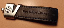 VW Volkswagen Genuine Main Dealer Key Fob, black leather with blue stitching.