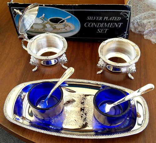 Boxed silver plated lions - plated, head