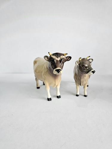 Pair beswick figurines cow - beswick,