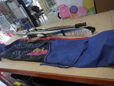 Pair of Volkl Attiva Sol Voile 154 cm Skis and Poles in a Salomon soft ski bag