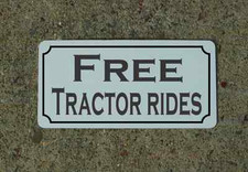 FREE TRACTOR RIDES Metal Sign 