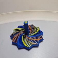 Kinetic Spinning Top -