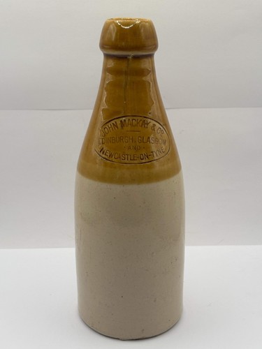 Old stoneware stout bottle