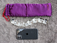 A solid glass Coco de Mer personal 'massager' or sculpture.