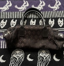 Patrick Cox Monogram Logo