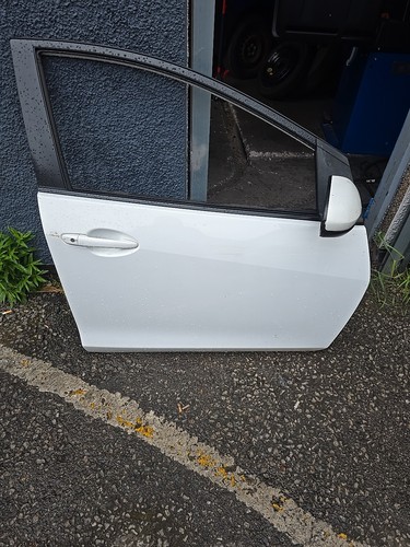Mazda ts2 driver side - front,