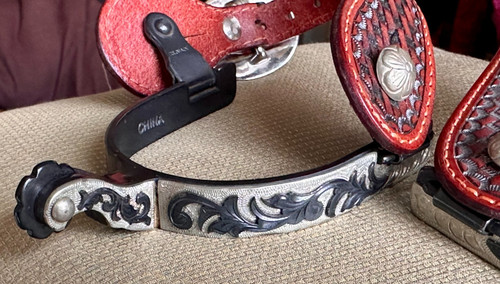 Pair western style - of, engraved