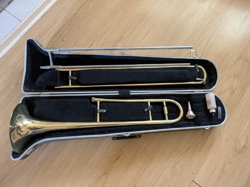 Brass trombone with - brass, mouthpiece