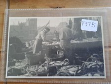 Trawler Men Unloading Crates of Fish. Vintage Real Photo  Postcard