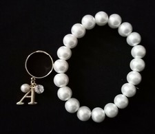 Primark Atmosphere 'A' letter gold ring and faux white pearl bracelet jewellery