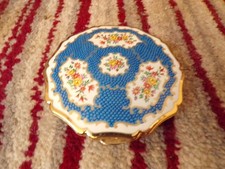 VINTAGE STRATTON BLUE FLORAL POWDER COMPACT. 3.4 INCHES IN DIAMETER