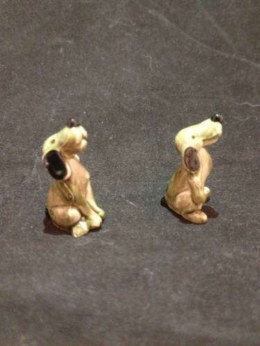 Two small dog statues - two,
