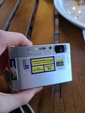 Sony DSC-T100 8.1MP Digital Cyber-shot Camera Black 5x Optical zoom