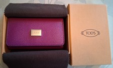 Tod's leather card and key wallet, purple outer with red interior, new in box.
