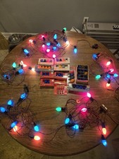 Vintage Christmas Lights C 7  Size.  Many extra bulbs. 5 Strings Altogether
