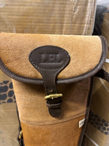 Cow hide and leather gun - hide,