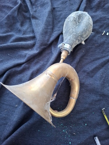 Vintage single twist brass car
