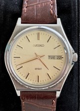 Seiko Spirit 7N48-7000 Quartz Japan Made Men’s Watch – Champagne Dial, Day-Date