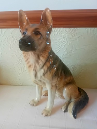 Large seated fireside - , beswick