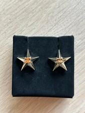 Authentic Chanel star CC logo