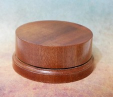 Sapele round wooden display - round,